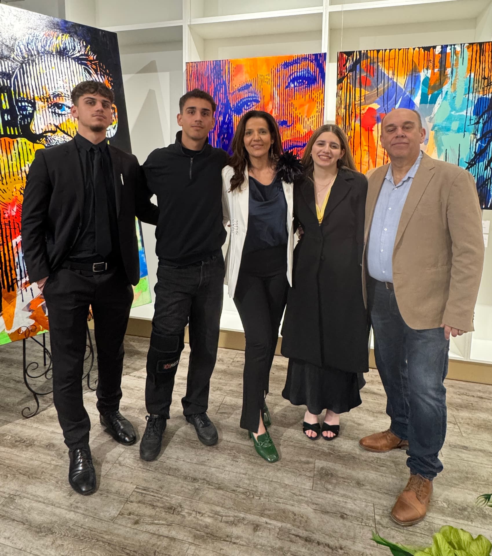 Mary Di Carlo with family at an exhibition